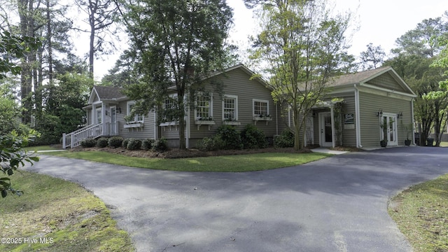 1914 Howard Ave, Tarboro, NC 27886 - view of front facade with french doors and aphalt driveway