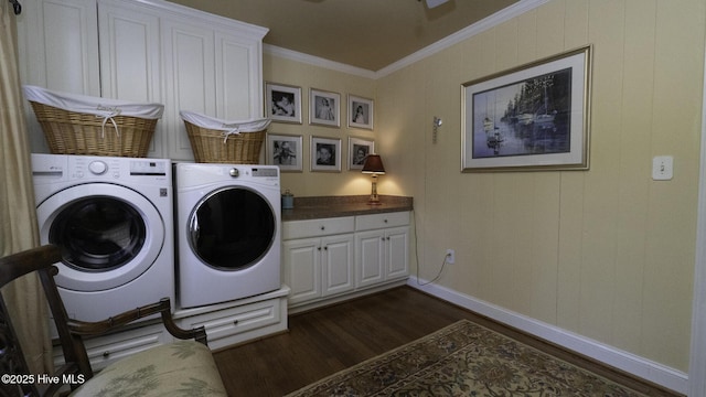 1914 Howard Ave, Tarboro, NC 27886 - washroom featuring cabinet space, independent washer and dryer, ornamental molding, dark wood-style floors, and baseboards