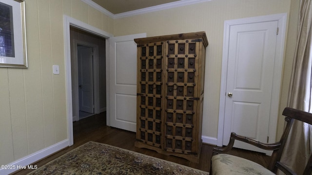 1914 Howard Ave, Tarboro, NC 27886 - wine area featuring ornamental molding, baseboards, and dark wood-type flooring