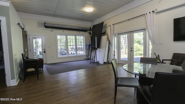 1914 Howard Ave, Tarboro, NC 27886 - dining room featuring crown molding, french doors, a healthy amount of sunlight, and dark wood-type flooring