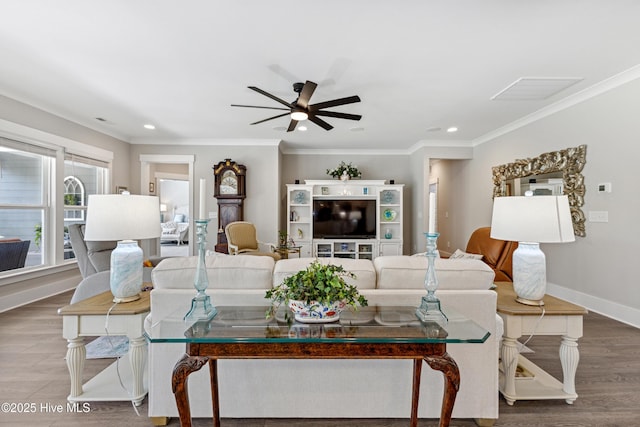 living area with recessed lighting, crown molding, ceiling fan, and wood finished floors