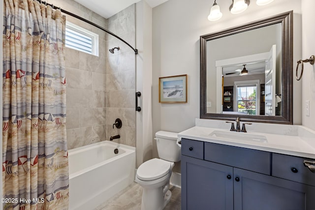 full bath with shower / bath combo with shower curtain, toilet, and vanity