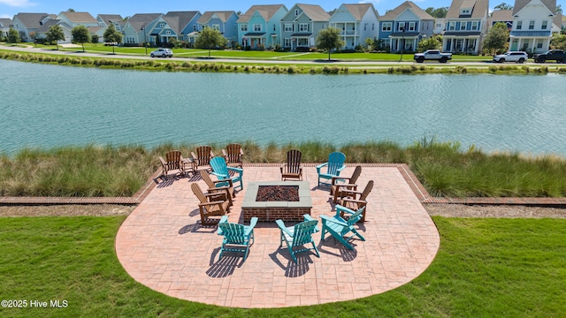 water view featuring a residential view and a fire pit