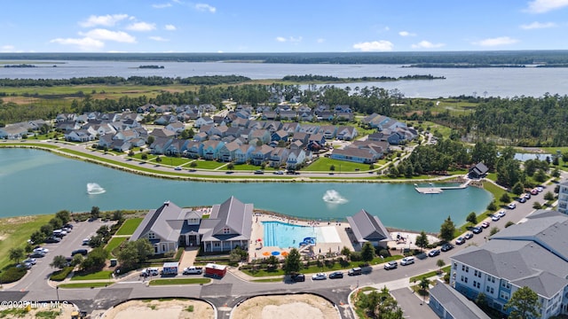 aerial view with a water view and a residential view
