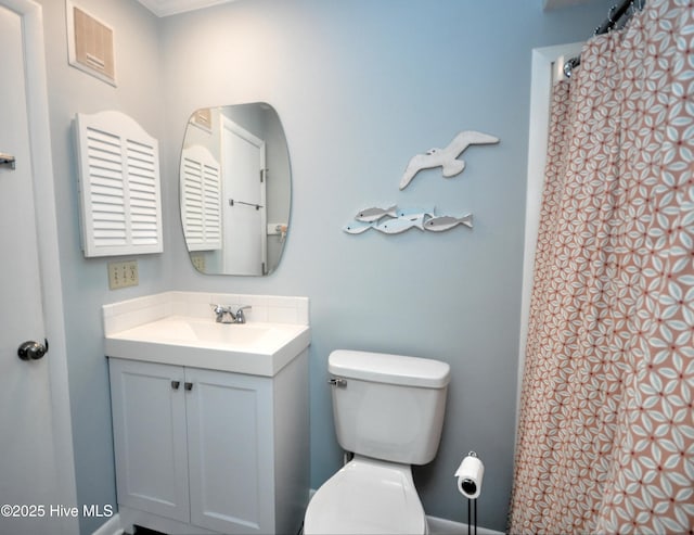 full bathroom featuring vanity, visible vents, and toilet