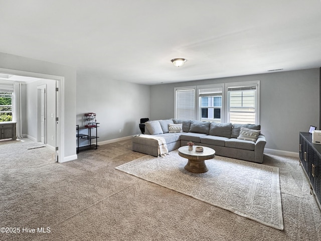 7845 Champlain Dr, Wilmington, NC 28412 - carpeted living room featuring baseboards