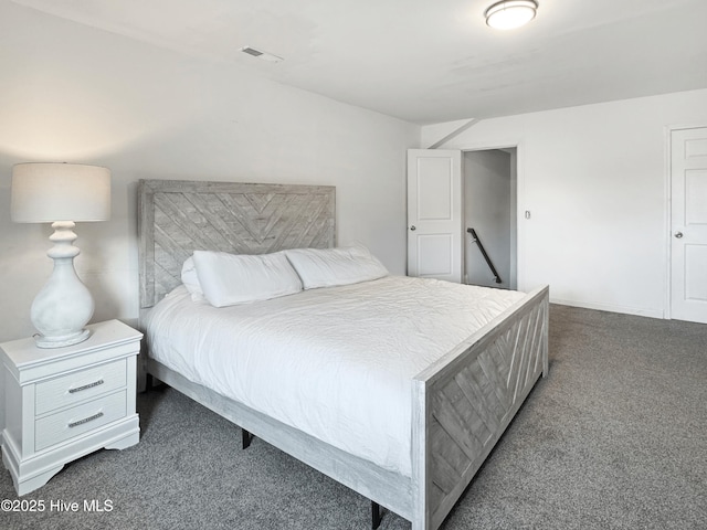 7845 Champlain Dr, Wilmington, NC 28412 - bedroom with dark carpet