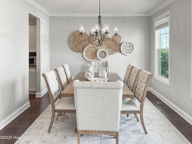 7845 Champlain Dr, Wilmington, NC 28412 - dining room featuring baseboards, wood finished floors, a notable chandelier, and a healthy amount of sunlight