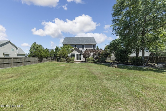 view of yard featuring a fenced backyard and a pergola