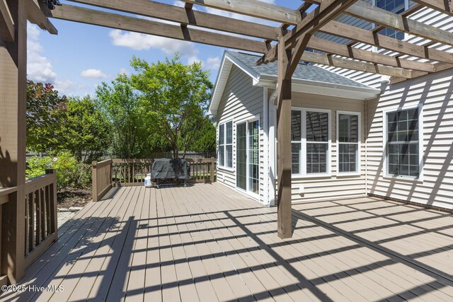 wooden terrace with a pergola
