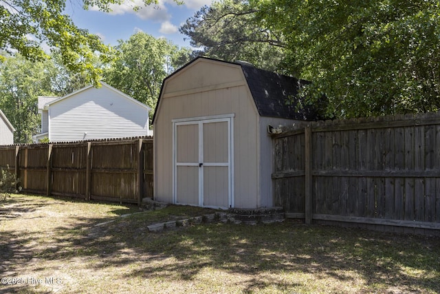 view of shed featuring a fenced backyard
