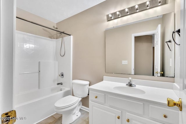 bathroom featuring vanity, toilet, baseboards, shower / bathing tub combination, and tile patterned floors