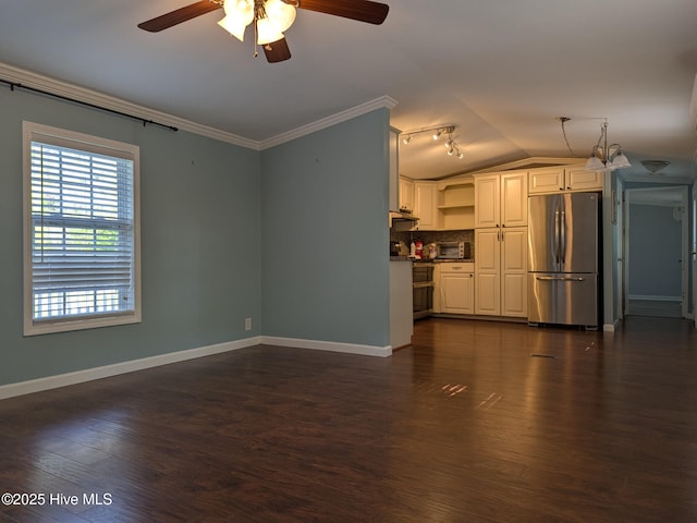 unfurnished living room with a ceiling fan, crown molding, vaulted ceiling, baseboards, and dark wood-style floors