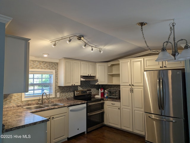 kitchen featuring dark countertops, open shelves, a sink, under cabinet range hood, and stainless steel appliances