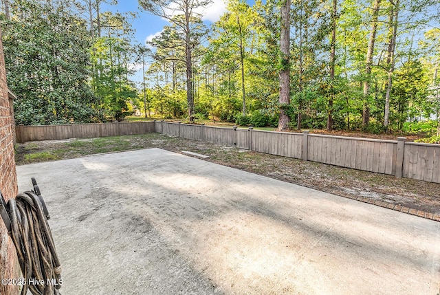 14 Palmer Dr, Shallotte, NC 28470 - fenced backyard featuring a patio area