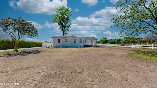 view of side of home with crawl space