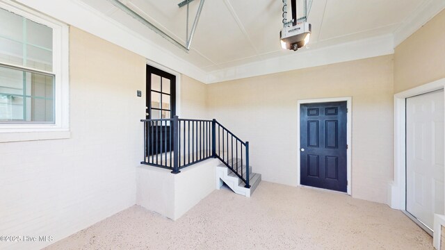 entrance to property featuring stucco siding