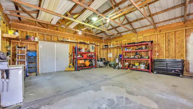 garage with a workshop area