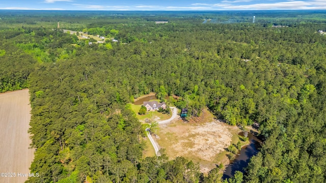 aerial view featuring a forest view