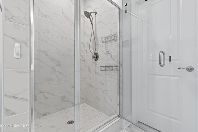 bathroom with a stall shower