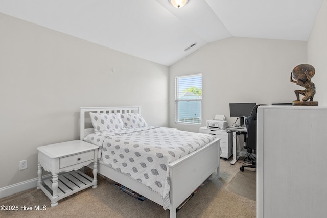 bedroom with baseboards, vaulted ceiling, light colored carpet, and visible vents