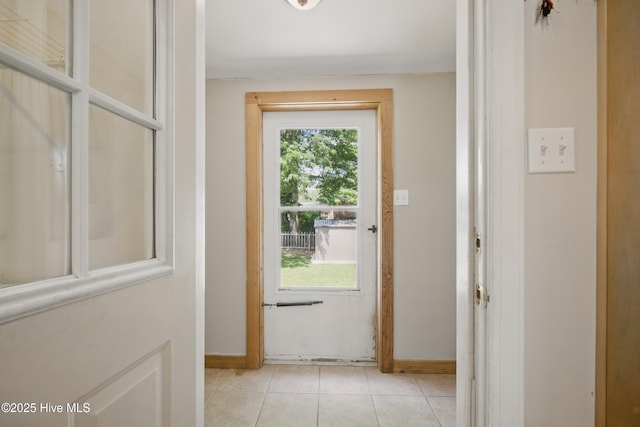 902 Hunnicutt Ave, Elizabeth City, NC 27909 - doorway featuring light tile patterned floors and baseboards