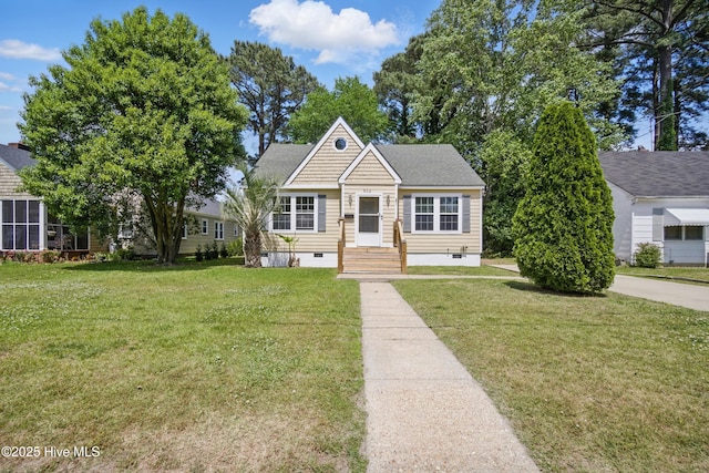 902 Hunnicutt Ave, Elizabeth City, NC 27909 - bungalow featuring a front lawn and crawl space