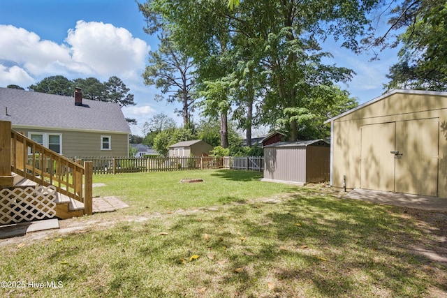 902 Hunnicutt Ave, Elizabeth City, NC 27909 - view of yard with an outbuilding, a shed, and a fenced backyard