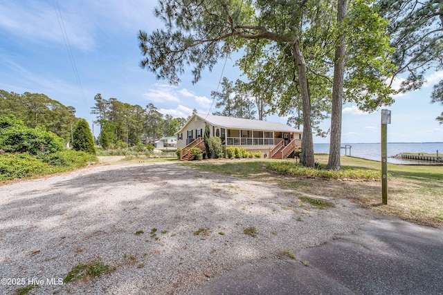966 W Island View Rd, Bath, NC 27808 - view of front of property with covered porch, a water view, and stairs