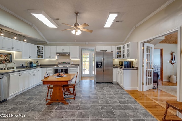 966 W Island View Rd, Bath, NC 27808 - kitchen with dark countertops, appliances with stainless steel finishes, a sink, and lofted ceiling