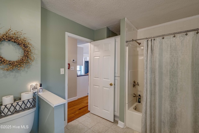 966 W Island View Rd, Bath, NC 27808 - full bathroom with tile patterned flooring, shower / bath combo, toilet, and a textured ceiling