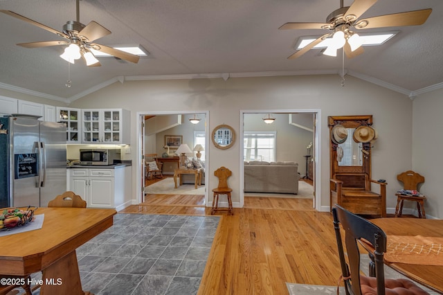 966 W Island View Rd, Bath, NC 27808 - kitchen with white cabinetry, ceiling fan, lofted ceiling, and stainless steel appliances