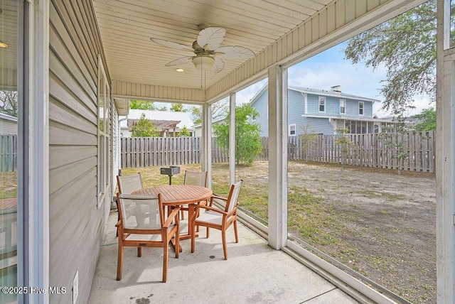 102 SW 8th St, Oak Island, NC 28465 - sunroom with a ceiling fan and outdoor dining space