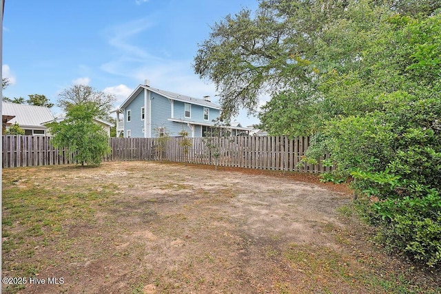 102 SW 8th St, Oak Island, NC 28465 - view of yard featuring a fenced backyard
