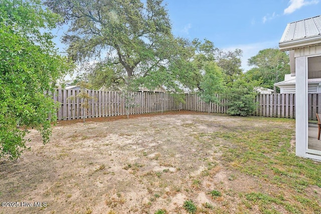 102 SW 8th St, Oak Island, NC 28465 - view of yard with a fenced backyard