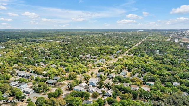 102 SW 8th St, Oak Island, NC 28465 - drone / aerial view with a wooded view