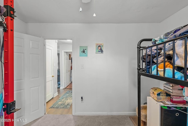 bedroom featuring baseboards