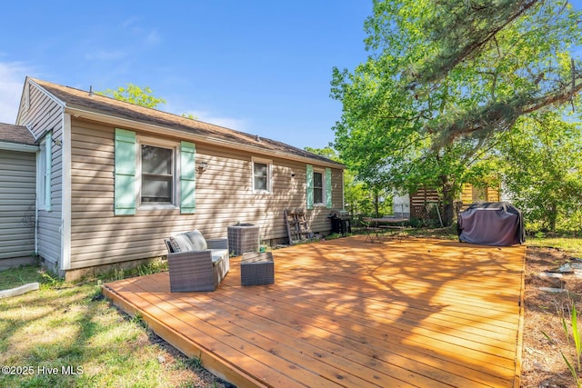 wooden deck featuring central AC