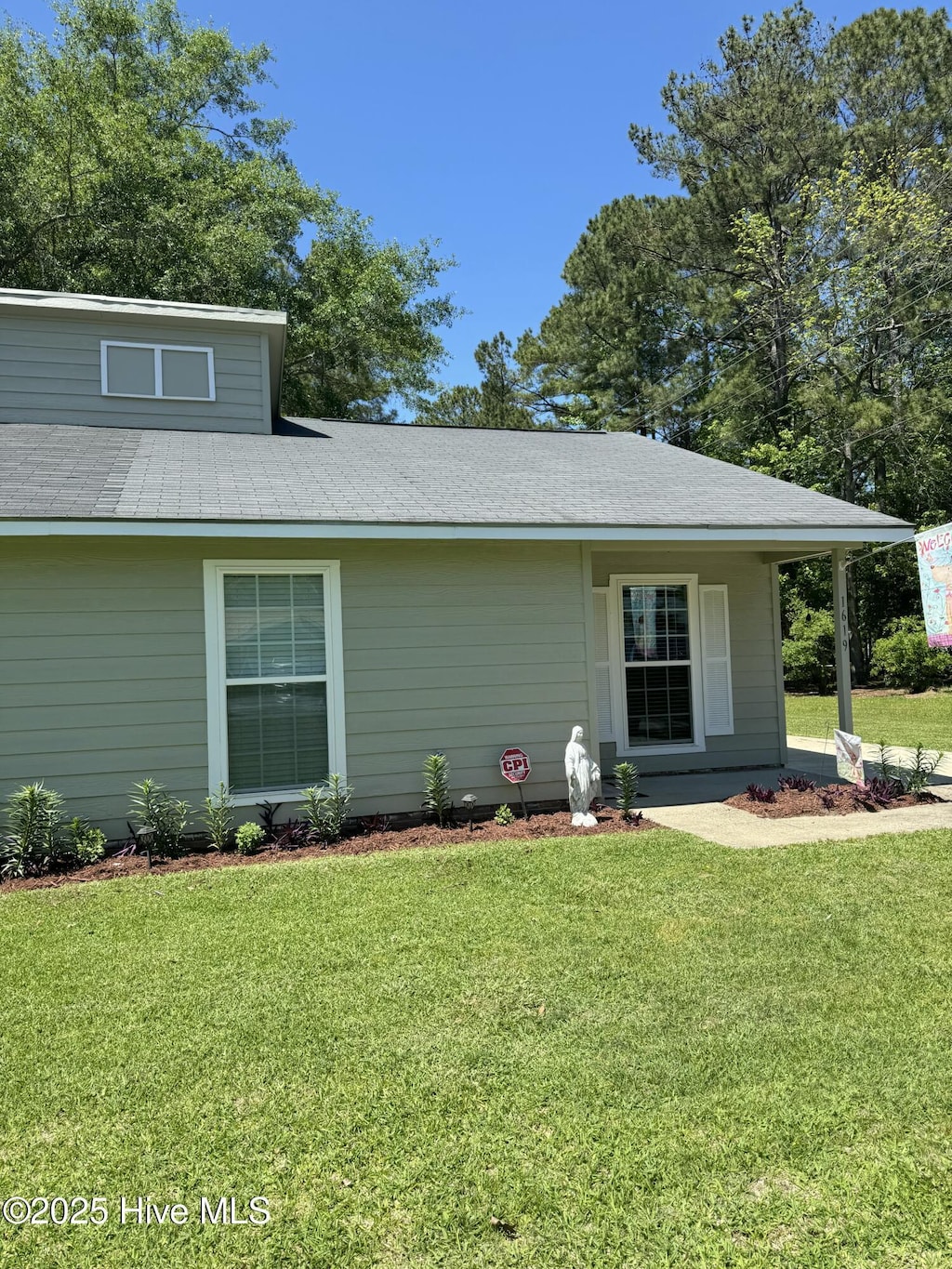 exterior space with a yard