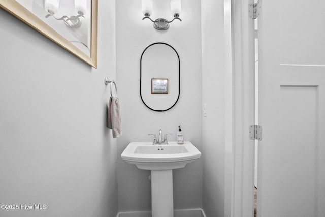 bathroom with baseboards