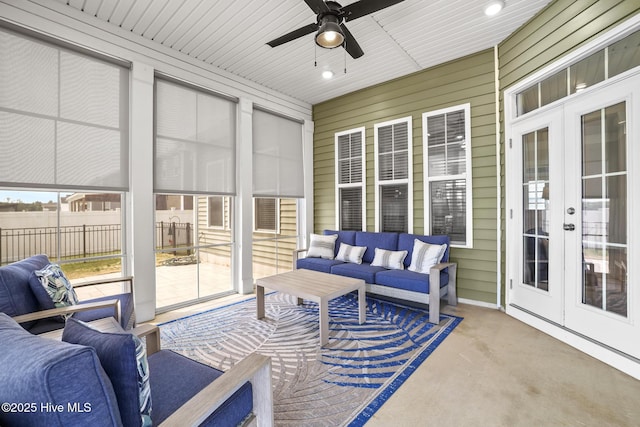 sunroom with ceiling fan, french doors, and an outdoor hangout area