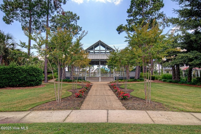 exterior space featuring a gazebo and a yard
