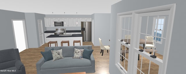 interior space featuring light wood-type flooring and french doors