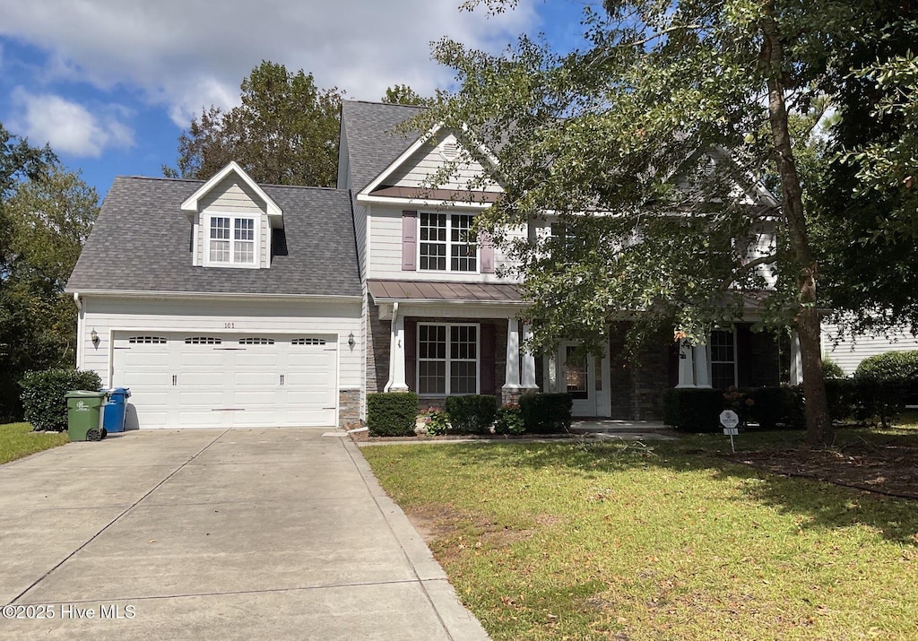 161 Marina Wynd Way, Sneads Ferry, NC 28460 - view of front of house with a garage, a front lawn, stone siding, a shingled roof, and concrete driveway