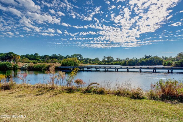 222 Rouen Ct, Wilmington, NC 28412 - community pool with a patio, fence, and view of scattered trees
