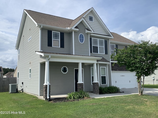 craftsman-style home featuring a front lawn, a garage, concrete driveway, central air condition unit, and covered porch