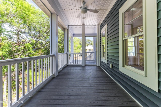 229 NE 34th St, Oak Island, NC 28465 - porch featuring ceiling fan