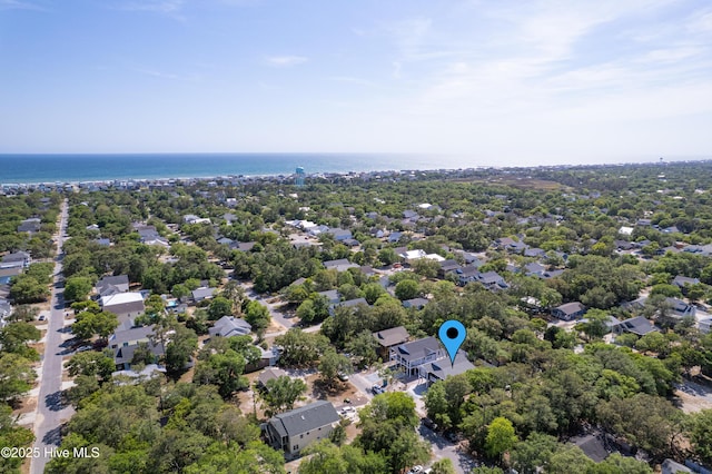birds eye view of property with a water view and a residential view