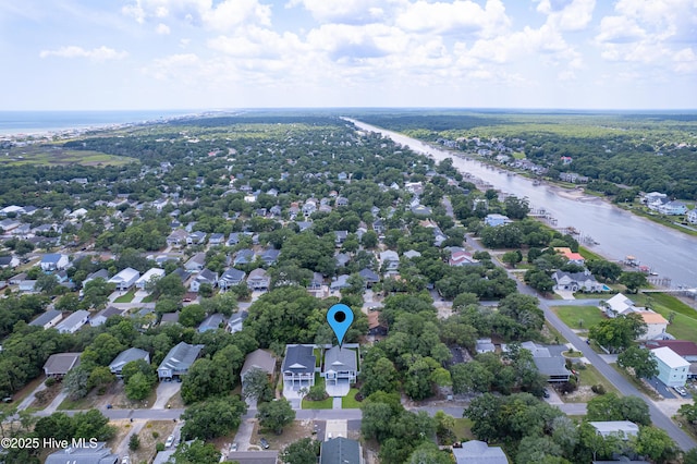 229 NE 34th St, Oak Island, NC 28465 - aerial perspective of suburban area with a nearby body of water