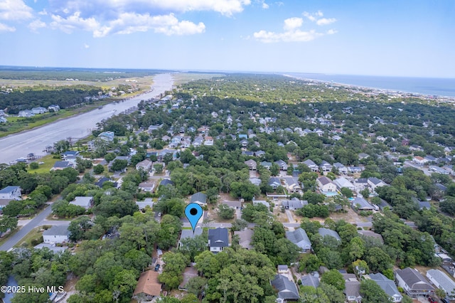 229 NE 34th St, Oak Island, NC 28465 - aerial view of residential area with a large body of water